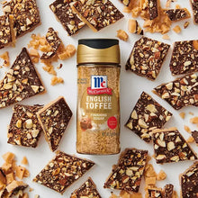 English toffee finishing sugar canister with scattered toffee and chocolate pieces
