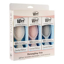 Mini detangler brush trio gift pack with three iridescent brush heads in three colors