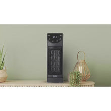 Ceramic desktop heater with base and top control buttons, black