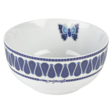 Blue-and-white ceramic bowl with butterfly accent and dotted rim