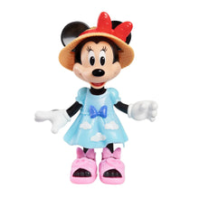 Minnie Mouse articulated doll in light blue dress, pink shoes, and red bow hat