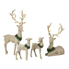Resin deer set of 4, beige standing figures with gold antlers and green garlands