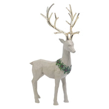 Single resin deer figurine, beige standing deer with gold antlers and green garland