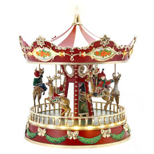 Animated carousel toy with red crown top, horse riders, and gold rotating ring