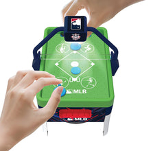 Green MLB arcade desktop game base with speaker handle, hands placing pieces