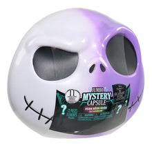 Jumbo mystery capsule toy skull with white and purple shell and front 'Mystery Capsule' label