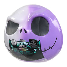 Jumbo mystery capsule toy skull with white and purple shell and printed mystery label
