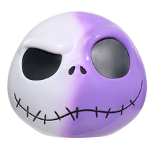 Jumbo mystery capsule toy skull face with white and purple shell and black stitched smile