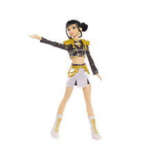 Full-body singing doll in black glitter jacket with gold belt and white skirt