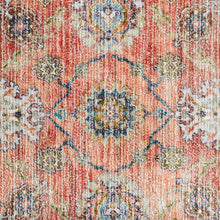 Red and blue central medallion accent mat design with distressed, multicolor pattern