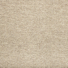 Tan woven accent mat close-up showing tight herringbone-style texture