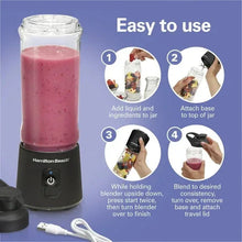 Hamilton Beach portable blender with pink smoothie in clear jar and black base