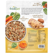 Freshpet dog food bag with bowl of kibble and pictured chicken and vegetables on label
