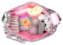 Unicorn-print diaper bag open with baby items and organizer pockets