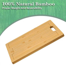 Bamboo cutting board with rounded corner, hand-hold notch, and flat surface.