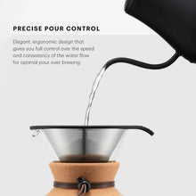 Electric gooseneck kettle pouring hot water from curved spout into a dripper