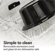 Removable stoneware crock and glass lid in a dish rack for cleaning.