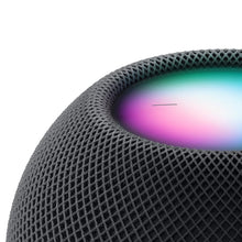 HomePod mini speaker with dark gray fabric grille and purple glow light ring