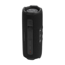 JBL Flip 7 portable speaker in black, side panel with buttons and charging port