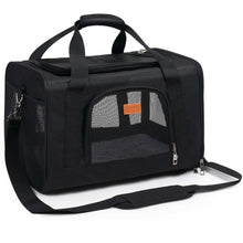 Black pet carrier with front mesh window, top handle, and attached shoulder strap