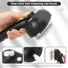 Black self-cleaning steam brush with removable nozzle attachment and oval head