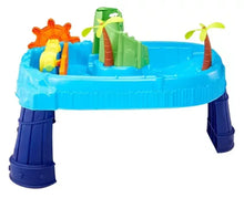 Blue outdoor water table toy with green slide, orange spinner, and two palm tree spouts