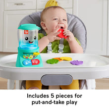 Teal Smoothie Maker toy on high-chair tray with colorful press-in pieces