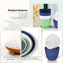 Green and dark blue ribbed plastic planters with saucers, indoor plant pots.