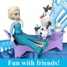 Frozen ice palace playset with Elsa doll on slide and Olaf figure on stand