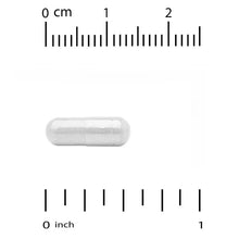 White veggie supplement capsule with measurement scale showing size