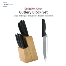 Knife set with stainless blades and black handles in bamboo storage block.