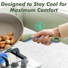 Nonstick cookware pot with green handle and heat-safety grip