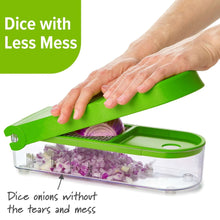 Green onion chopper with lid pressed down over halved onion, preparing to dice