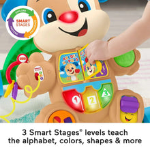 Close-up puppy walker toy with alphabet buttons and smiling dog face