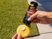 Meguiar’s Scratch-X scratch remover being applied to a yellow foam pad