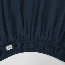 Navy fitted sheet with elasticized hem and smooth microfiber surface