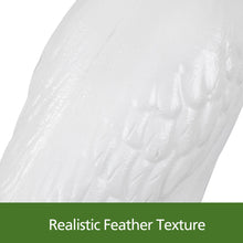 White goose statue with textured feather detail on the body.
