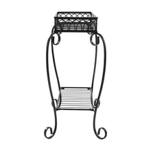 Black metal 2-tier plant stand with curved scroll legs and slatted shelves.