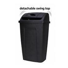 Black plastic trash can with swing-top lid, detachable lid detail on top.