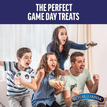 Royal Dansk tin used for game day snacks with a family gathered around