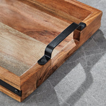 Acacia wood serving tray with black handle and corner brackets, close-up