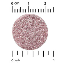 Pink mixed berry chewable tablet with size guide ruler markings