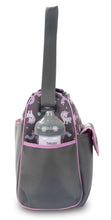 Gray unicorn-print diaper bag viewed from back with tall carry handle