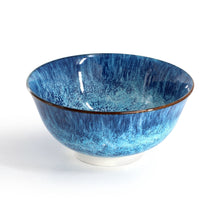 Blue speckled porcelain bowl with gold rim, glossy interior
