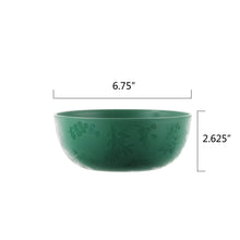 Green plastic serving bowl with etched holly motif