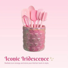 Pink iridescent ceramic utensil crock with embossed hearts and pink utensil handles