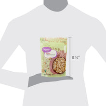 Organic raw whole cashews pouch shown on person-size guide