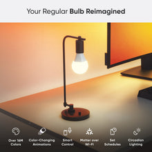 Nanoleaf A19 LED smart bulb in a standing lamp, warm white light