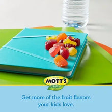 Mott's fruit flavored snack pouches with fruit-shaped gummies on tray
