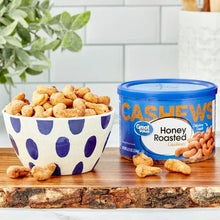 Honey roasted cashews canister with cashews in a patterned bowl